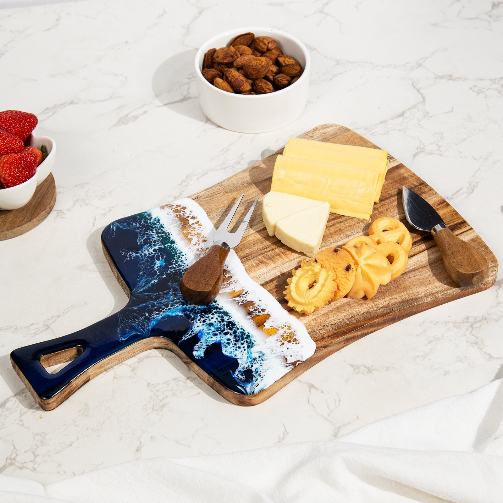 Acacia wood and epoxy resin charcuterie board with handle for cheese bread fruit and light prep